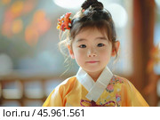 Korean girl wearing traditional hanbok dress posing indoors. Стоковое AI-изображение, AI-художник Иван Рябоконь / Фотобанк Лори