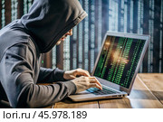 The hacker is working on a laptop, digital codes on a virtual background. Hacking and protecting online data. Digital technologies, software development. Стоковое AI-изображение, AI-художник Photojuli / Фотобанк Лори