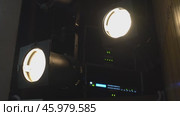 The bright white stage lighting illuminating the empty platform creates the effect of a vibrant theatrical presence. Стоковое видео, видеограф Darya Komarova / Фотобанк Лори