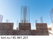 Construction site, residential building build, metal armature concrete structure. Стоковое фото, фотограф Spirit River / Фотобанк Лори