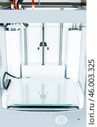 3d printer with bright red filament. Стоковое фото, фотограф Сергей Толмачёв / Фотобанк Лори