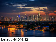 Illuminated skyline of colombo reflecting on beira lake at sunset. Стоковое AI-изображение, AI-художник Иван Рябоконь / Фотобанк Лори