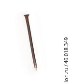 Old rusty nail isolated on a white background. Стоковое фото, фотограф Елена  Попкова / Фотобанк Лори