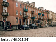 Klaipeda, Lithuania, February 2019, City street cloudy rainy day, little town. Редакционное фото, фотограф Spirit River / Фотобанк Лори