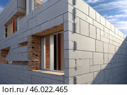 Modern prefabricated concrete house with exposed brick section under construction. Стоковое AI-изображение, AI-художник Иван Рябоконь / Фотобанк Лори