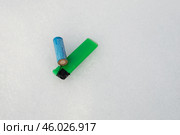 Петарда и зажигалка на снегу. Стоковое фото, фотограф Краснова Ирина / Фотобанк Лори