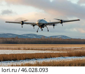 Военный беспилотник самолётного типа, оснащенный передовыми технологиями наблюдения. Стоковое AI-изображение, AI-художник Руслан Лесков / Фотобанк Лори