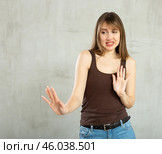 Young indifferent woman not agreeing to anything offered to her. Стоковое фото, фотограф Яков Филимонов / Фотобанк Лори