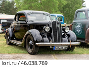 FINOWFURT, GERMANY - MAY 11, 2024: The retro car Plymouth Standard Six Modell PJ Business Coupe, 1935. Season opening of Race 61 Festival. Редакционное фото, фотограф Sergey Kohl / Фотобанк Лори