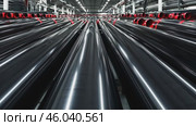 Long black red pipes. Large galvanized pipe stacked in industrial warehouse. Construction materials for infrastructure work. Metalwork. PVC pipes for sewerage pipeline, plumbing in the storage. Стоковое AI-видео, аниматор Марина Демидюк / Фотобанк Лори