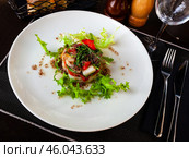 Codfish timbale with fried red peppers, arugula, olive oil. Стоковое фото, фотограф Яков Филимонов / Фотобанк Лори