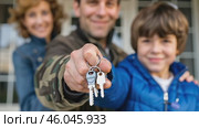 Homeowners. Happy young Indian family spouses standing outside holding car house flat apartment keys, celebrating new purchase buying real estate. Mortgage loan. New home. Mother, father and child. Стоковое AI-видео, аниматор Марина Демидюк / Фотобанк Лори