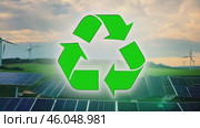 Green earth cover with Recycle symbol on green grass field on natural background. Waste and pollution elimination, clean and renewable energy concept, green world, eco friendly, environment day. Ecological problem, Green energy icon, background. Стоковое AI-видео, аниматор ALLA YURTAYEVA / Фотобанк Лори