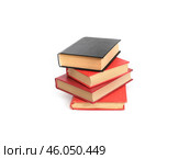 Red and black books isolated on a white background. Стоковое фото, фотограф Елена  Попкова / Фотобанк Лори