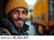 Smiling lorry delivery driver awaits loading at logistics complex. Стоковое AI-изображение, AI-художник Владимир Григорьев / Фотобанк Лори