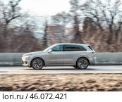 EV crossover SUV Li Auto L7 driving in motion blur on country road. Редакционное фото, фотограф Константин Григорьев / Фотобанк Лори