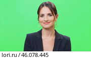 Businesswoman smiling gently with a confident on a green screen. Female dressed in a stylish formal outfit. Young beauty Asian professional woman isolated on green background. Chroma key backdrop. Стоковое AI-видео, аниматор Марина Демидюк / Фотобанк Лори