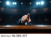Speaker pointing with finger at camera during public speech. Стоковое AI-изображение, AI-художник Евгений Харитонов / Фотобанк Лори