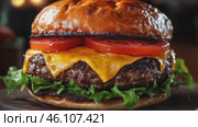 Gourmet Burger with a juicy beef patty, melted cheddar cheese, fresh lettuce, tomato, and a toasted brioche bun on a wooden board. Fast street food concept. Footage for culinary video blog. Стоковое AI-видео, аниматор Ирина Михайличенко / Фотобанк Лори