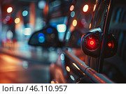Autonomous vehicle with lidar and camera sensors driving on city street at night. Стоковое AI-изображение, AI-художник Иван Рябоконь / Фотобанк Лори