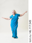Plus size fashion model, fat woman on beige background, overweight female body. Стоковое фото, фотограф Станислав Тарко / Фотобанк Лори