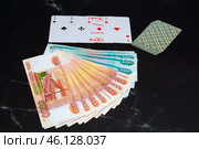 Колода карт деньги пачка купюры 5000 рублей 1000 рублей игральные карты тузы туз deck of cards money playing cards aces ace. Стоковое фото, фотограф Константин Козлов / Фотобанк Лори