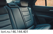 Stylish Interior of SUV, Luxury Seating. Elegant large powerful sports SUV, premium quality black leather seats. Car rear seats. New modern car inside. Lease, rental car, sell, buy. Loan credit. Стоковое AI-видео, аниматор Марина Демидюк / Фотобанк Лори