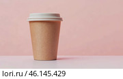 Front view of a Brown coffee paper cup. Mockup with lid. Set of craft paper cup for hot tea on beige pink background. Zero waste, plastic free concept. Disposable Recycled cup. Coffee to go mock-up. Стоковое AI-видео, аниматор Марина Демидюк / Фотобанк Лори