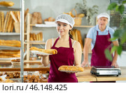 Young woman with bocadillo in bakery. Стоковое фото, фотограф Яков Филимонов / Фотобанк Лори