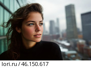 Young woman with contemplative expression overlooking cityscape on a cloudy day. Стоковое AI-изображение, AI-художник Антон Гвоздиков / Фотобанк Лори