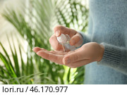 Woman using antibacterial hand sanitizer, closeup. Стоковое фото, фотограф Pixel_shot / Фотобанк Лори