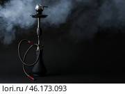 Hookah with fume on dark background. Стоковое фото, фотограф Pixel_shot / Фотобанк Лори