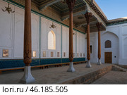 View of the courtyard of the Bahauddin Naqshbandi Memorial Complex and the entrance to the Amir Muzaffarkhan Mosque on a sunny day, Bukhara, Uzbekistan. Стоковое фото, фотограф Ula Ulachka / Фотобанк Лори