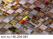 Silicon semiconductor wafer close-up. In electronics, a wafer also called a slice or substrate is a thin slice of semiconductor, a crystalline silicon, used for the fabrication of integrated circuits. Стоковое фото, фотограф Андрей Армягов / Фотобанк Лори