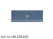 Diary in blue leather cover isolated on white background. Inscription in Russian "Directorate of the President of the Russian Federation" Стоковое фото, фотограф Елена  Попкова / Фотобанк Лори