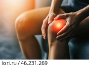 Knee pain, joint inflammation, arthritis and degenerative changes, woman suffering from leg ache and doing self-massage. Стоковое AI-изображение, AI-художник Станислав Тарко / Фотобанк Лори