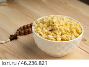 Lenten porridge - the path to spiritual cleansing of the use of a wooden background symbolizes simplicity and humility, which help the believer focus on spiritual life in the days of the Great Lent. Стоковое фото, фотограф Скрипачев Антон / Фотобанк Лори