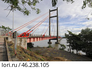 View of the Tempisque River Bridge or Puente La Amistad de Taiwan over the Tempisque River. Guanacaste province, Nicoya Peninsula. Costa Rica, Central America. Редакционное фото, фотограф Bala-Kate / Фотобанк Лори
