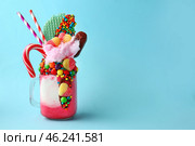 Delicious freak shake on color background. Стоковое фото, фотограф Pixel_shot / Фотобанк Лори