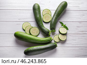 Ripe zucchinis on white wooden table. Стоковое фото, фотограф Pixel_shot / Фотобанк Лори
