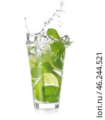 Glass of fresh mojito with splashes on white background. Стоковое фото, фотограф Pixel_shot / Фотобанк Лори