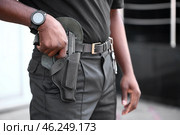 African-American security guard outdoors, closeup. Стоковое фото, фотограф Pixel_shot / Фотобанк Лори