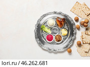 Composition with Passover Seder plate on white background. Стоковое фото, фотограф Pixel_shot / Фотобанк Лори