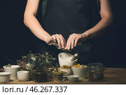 Female alchemist making elixir in laboratory. Стоковое фото, фотограф Pixel_shot / Фотобанк Лори