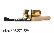 Tibetan singing bowl with beads on white background. Стоковое фото, фотограф Pixel_shot / Фотобанк Лори