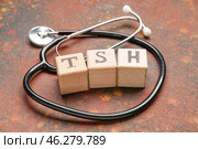 Cubes with abbreviation TSH and stethoscope on color background. Стоковое фото, фотограф Pixel_shot / Фотобанк Лори