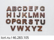 Wooden letters on white background. Alphabet concept. Стоковое фото, фотограф Pixel_shot / Фотобанк Лори