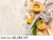 Ramekins with tasty julienne and ingredients on light background. Стоковое фото, фотограф Pixel_shot / Фотобанк Лори
