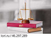 Scales of justice with books on lawyer's workplace. Стоковое фото, фотограф Pixel_shot / Фотобанк Лори
