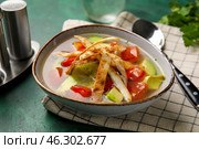 Bowl of tasty Sopa de Lima soup on table. Стоковое фото, фотограф Pixel_shot / Фотобанк Лори